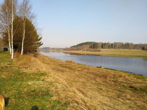 istock Spring sunny morning on the river bank 1147965138