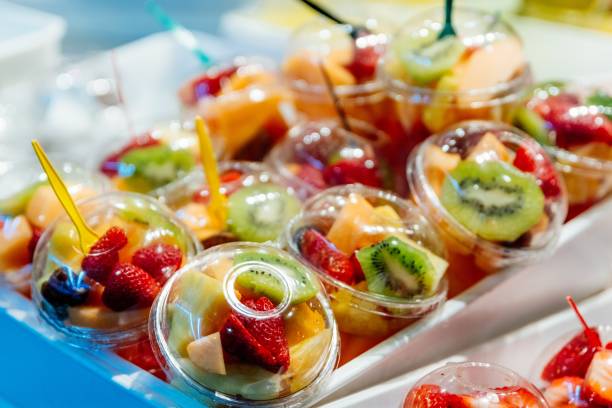 istock Plastic cups with delicious fruits for sale 1147973733