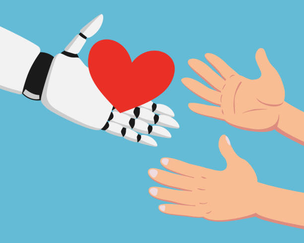 istock White robotic hand holding red heart and hands of a man 1147980032