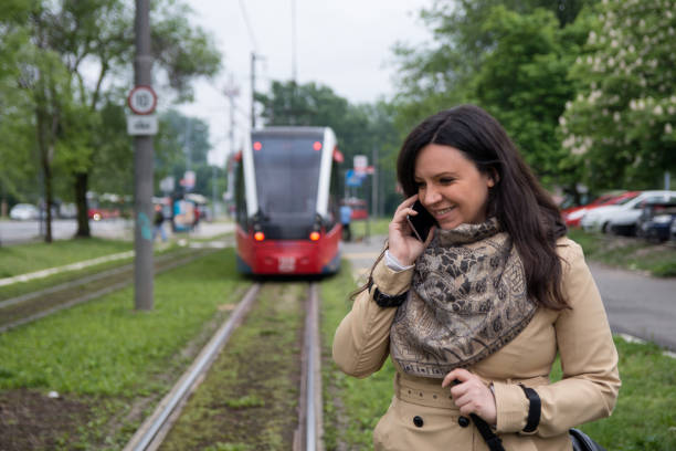 istock Woman waiting for train at the station 1147981104