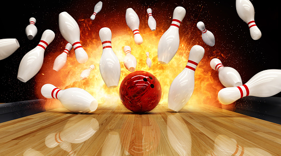 Bowling strike hit with fire explosion. Concept of success and win.