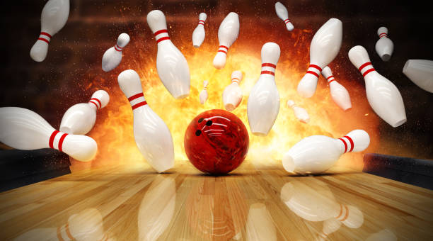 Bowling strike hit with fire explosion stock photo