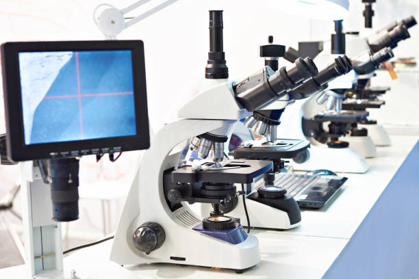istock Modern stereo microscopes with monitor 1147984936