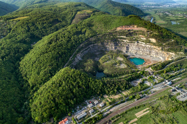 istock Quarry for the extraction of stone and sand. 1147986351