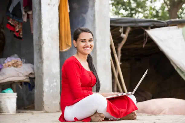 Photo of Indian Young girl working on laptop - stock images