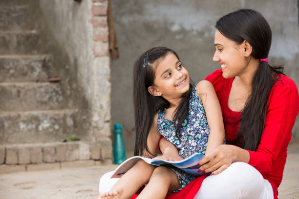 Mother Daughter - stock images Indian, Education, Student, Study, School Girl, the farmer and his wife pictures stock pictures, royalty-free photos & images