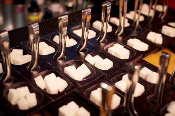 istock White sugar cubes on the buffet in the hotel. 1147988572