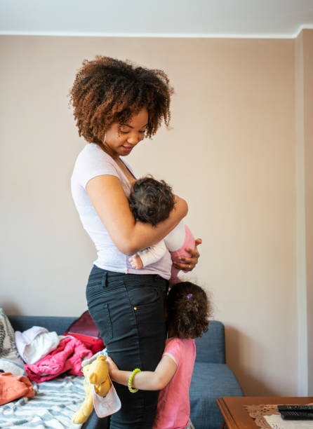 istock Mother and children at home 1147989979
