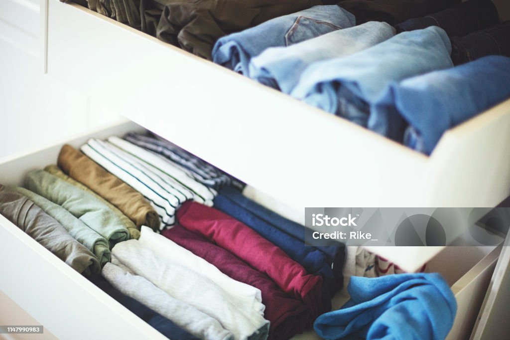 Tidy wardrobe Systematically tidy closet with fresh stuff Closet Stock Photo