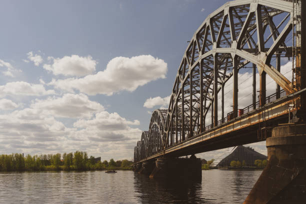 istock Railway bridge over the river in Riga 1147991297