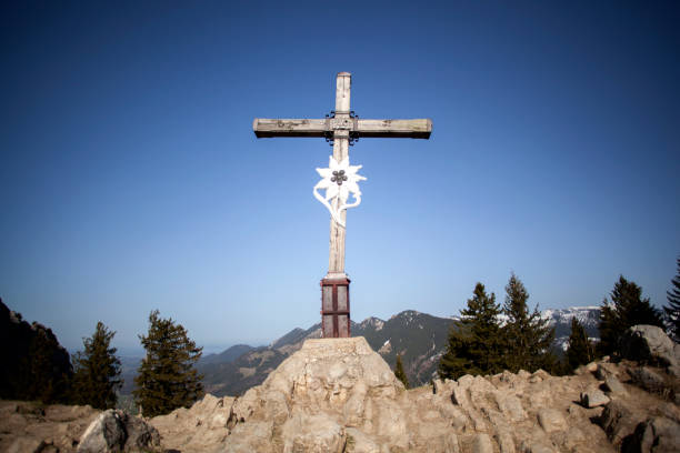 istock Summit cross of mountain Heuberg, Bavaria, springtime 1147991491