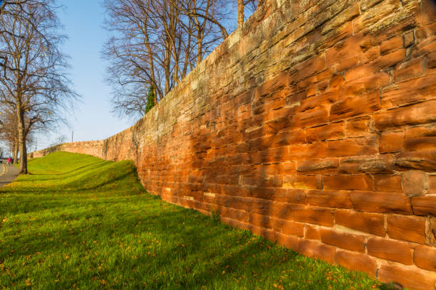 chester town wall, west side in sunlight. - chester england england cheshire west imagens e fotografias de stock