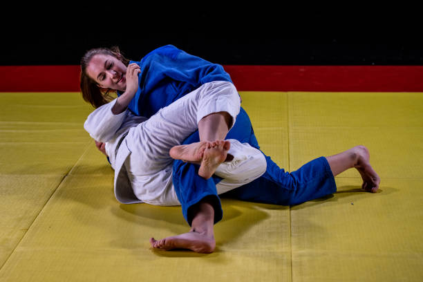 istock Judo players competing in judo match 1147997046