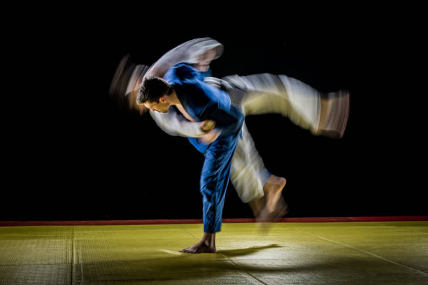 istock Judo players competing in judo match 1147997052