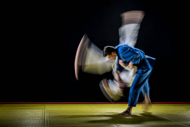 istock Judo players competing in judo match 1147997053