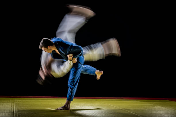 istock Judo players competing in judo match 1147997055