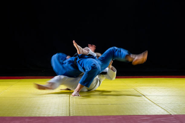 istock Judo players competing in judo match 1147997062