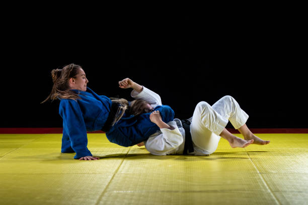 istock Judo players competing in judo match 1147997065