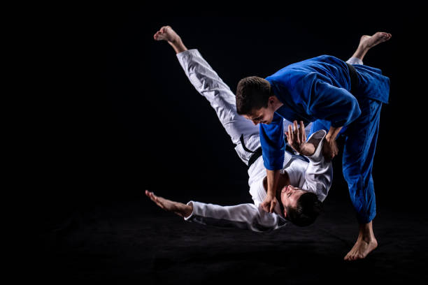 istock Judo players competing in judo match 1147997096