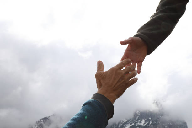 Giving helping hand.