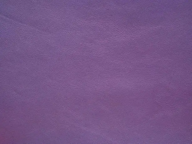 Photo of Seamless purple leather texture.