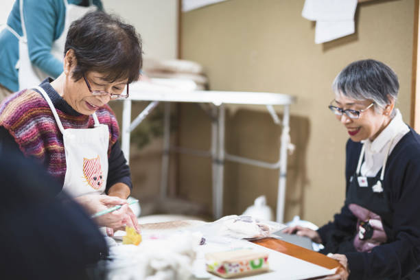 istock Group of Asian senior women working at studio 1147998042