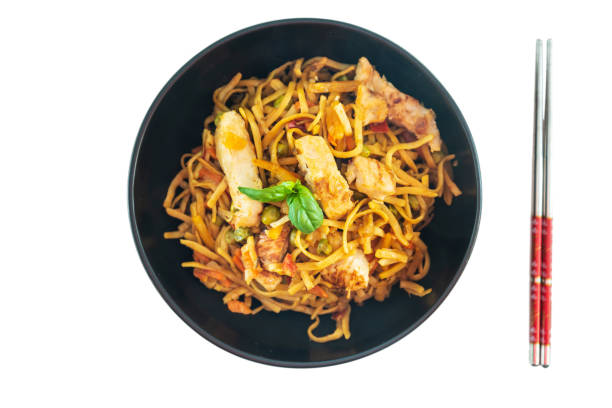 istock Vegetable noodles with chicken meat preparation 1148001974