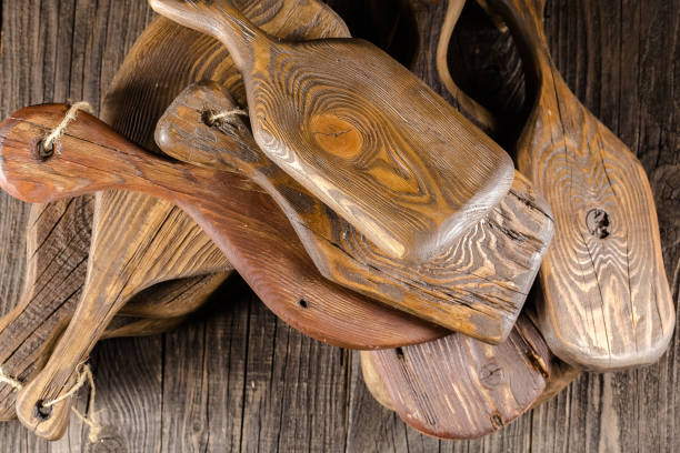 istock high detailed background texture kitchen chopping several many boards old vintage color of dark black with rifts and cracks, stripes one two three rings, wooden grain, abstract lie on the table 1148003029