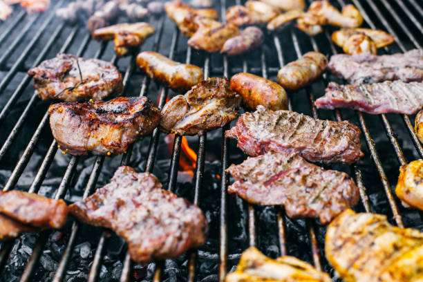istock Meat and sausages on the barbecue 1148003134