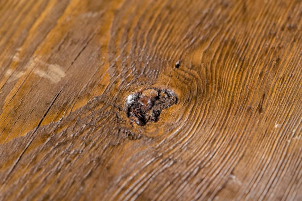istock Russia, rustic old vintage wooden cutting board for the kitchen, with a groove structure, stripes, lies, stands on the table are cracks, black, brown, round square oval right angles sharp, rope 1148003144