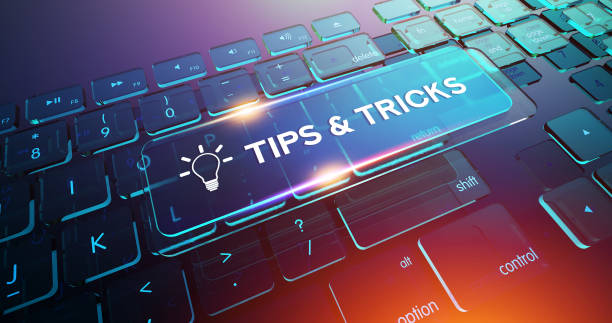 tips & tricks button on computer keyboard - magic trick imagens e fotografias de stock