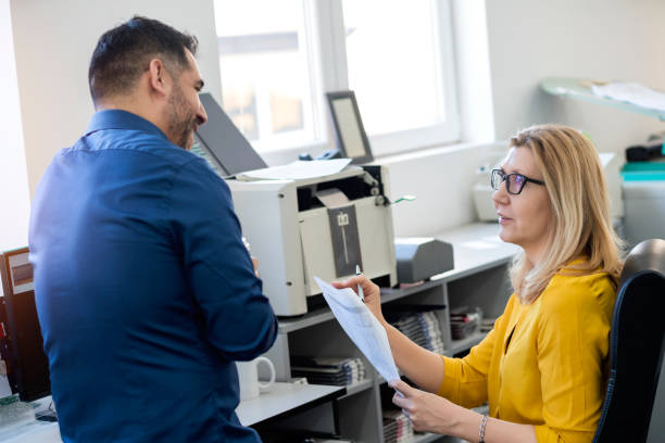 istock Coworkers in printing factory 1148007207