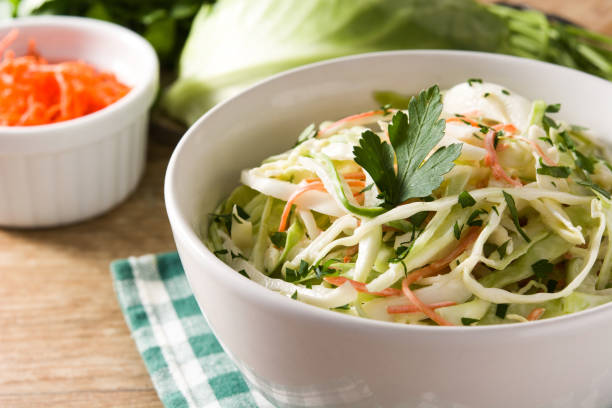 istock Coleslaw salad in white bowl 1148008011