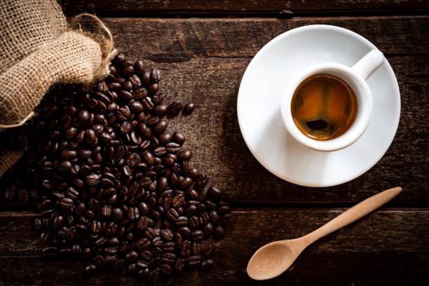 istock Coffee in a cup on a wooden table. 1148009069
