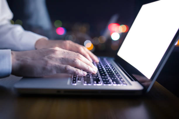 istock Working on laptop in the night 1148010216