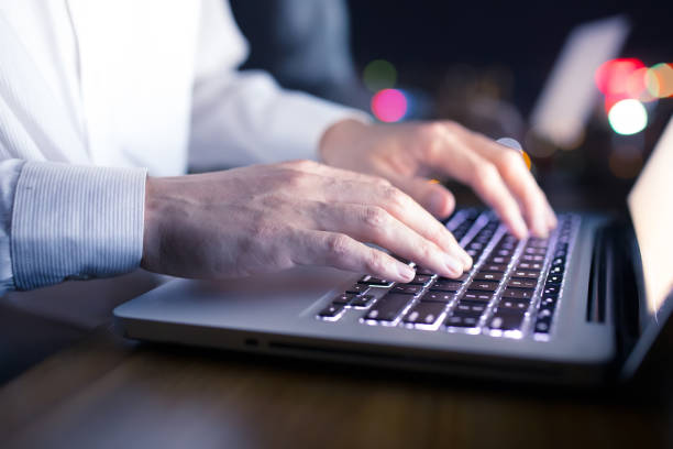 istock Working on laptop in the night 1148010226
