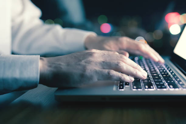 istock Working on laptop in the night 1148010234