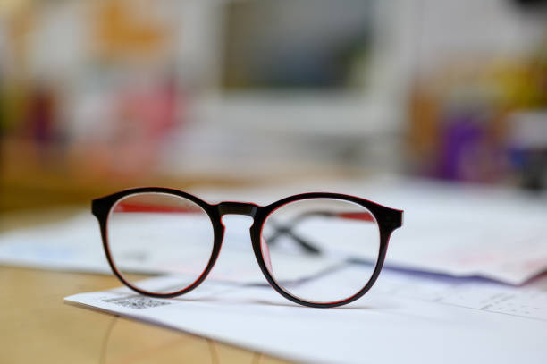 istock Staff eye glasses placed on the office desk 1148010848