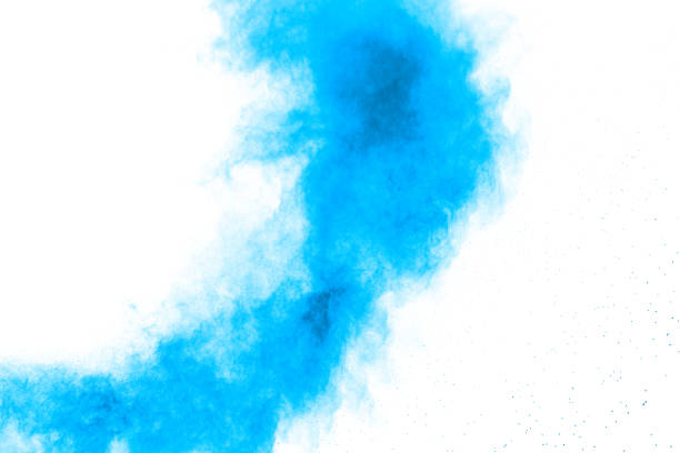 istock Abstract blue dust explosion on white background.Freeze motion of blue powder splash. Painted Holi in festival. 1148011791