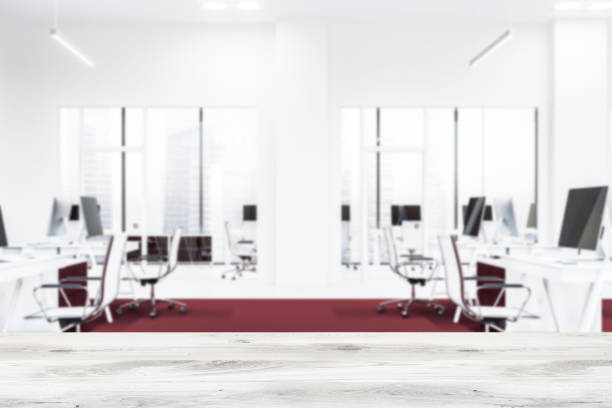 istock Side view of white office with red carpet blur 1148011978