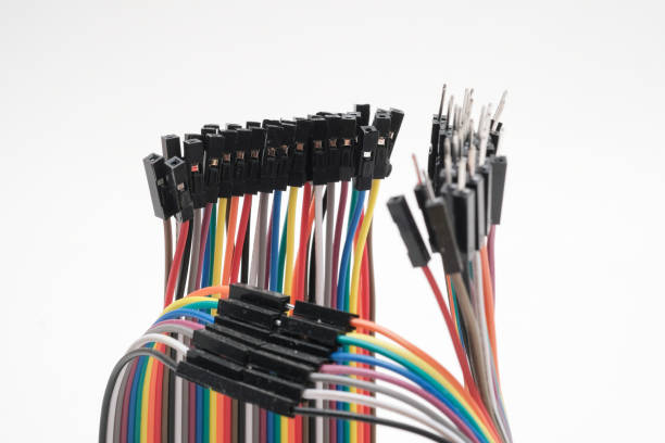 istock A metal robot and an electronic board 1148012151