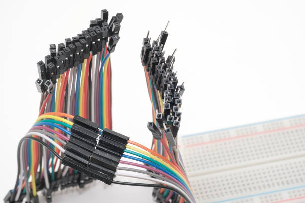 istock A metal robot and an electronic board 1148012251