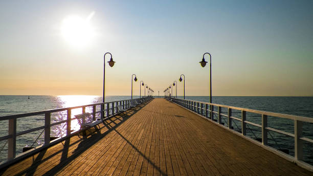istock Sunrise over pier in Gdynia, Poland. 1148012648