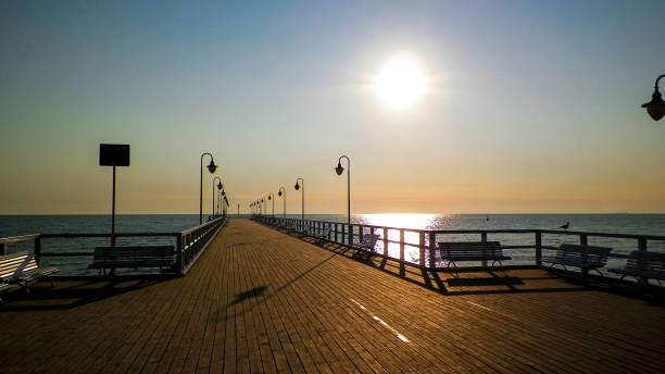 istock Sunrise over pier in Gdynia, Poland. 1148012661