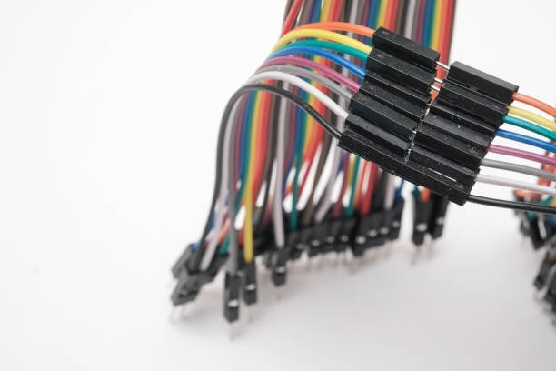 istock A metal robot and an electronic board 1148013188