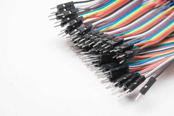 istock A metal robot and an electronic board 1148013256