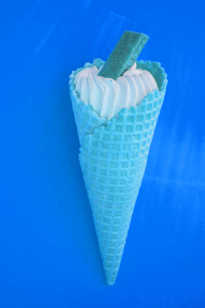 istock Ice cream CONE NEON COLORS pop art Flatley art, blue background 1148013430