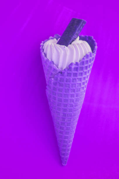 istock Ice cream CONE NEON COLORS pop art Flatley art, purple background 1148013431
