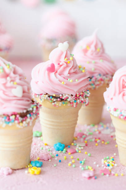 istock Pink soft serve ice cream with sprinkles 1148015215
