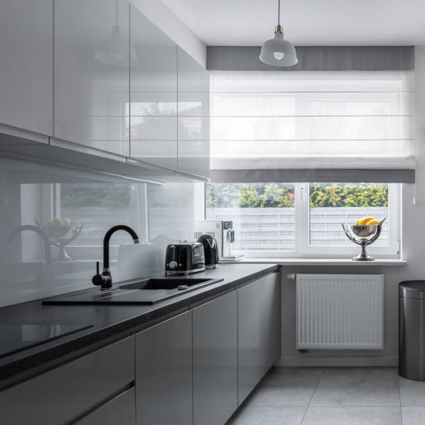 istock Narrow kitchen with contemporary furniture 1148018046